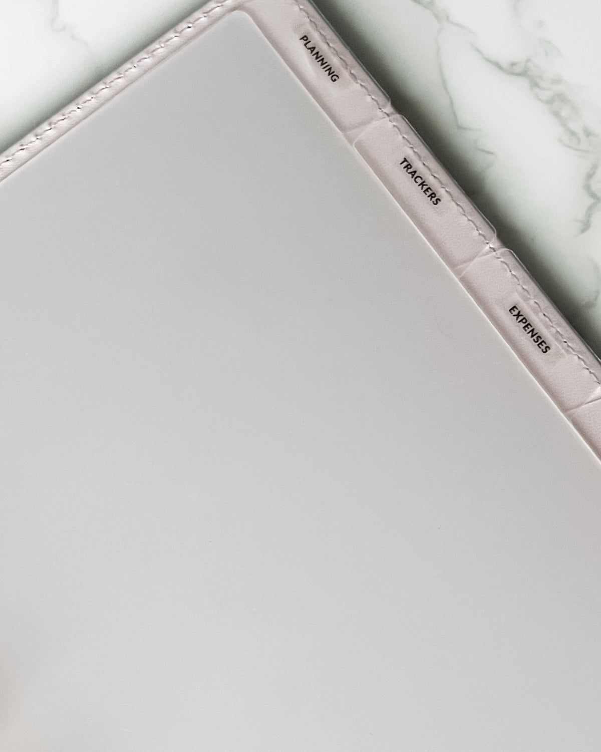 A5 Transparent divider tabs blank with stickers — tab dividers for discbound planners, flat lay