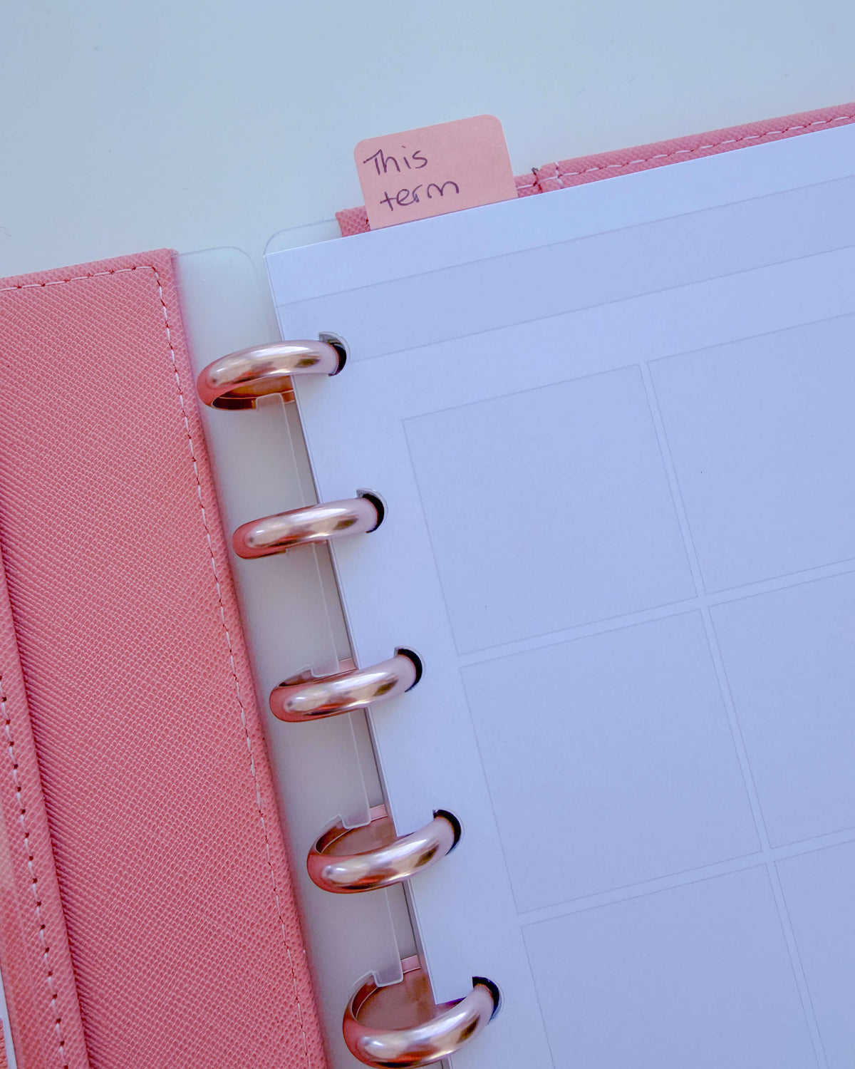 Peach gradient page markers — tab dividers for discbound planners, flat lay