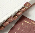 Textured monthly tab dividers