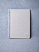 Oat snap-on cover — discbound planner cover, flat lay